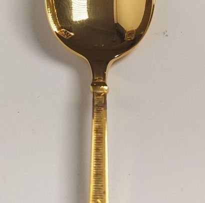 12 mocha spoons and sugar tongs in silver...