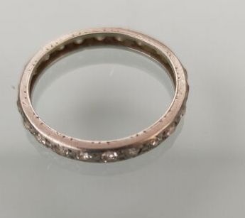 American wedding band in white gold set with...