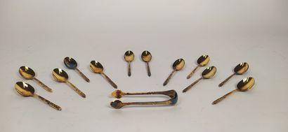 12 mocha spoons and sugar tongs in silver...