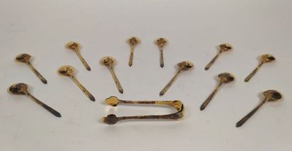 12 mocha spoons and sugar tongs in silver...