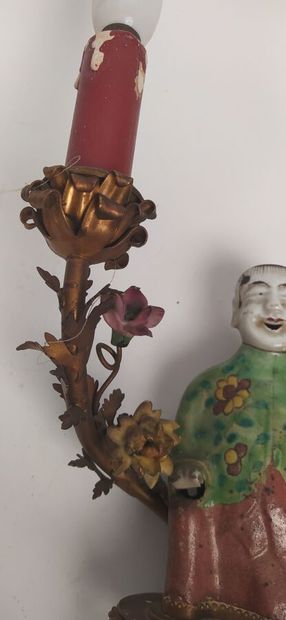 Pair of sconces in metal with subject in...