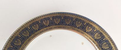 SEVRES
Three porcelain plates with blue marli...