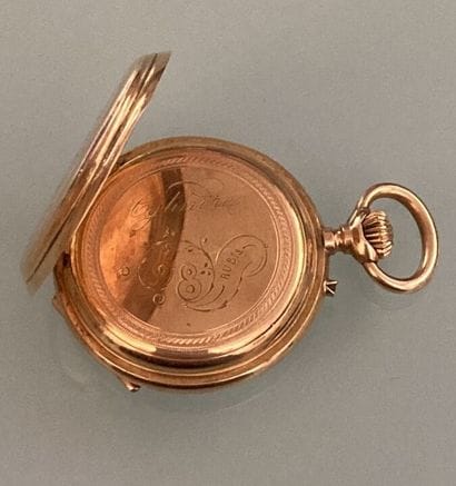 18k yellow gold collar watch
Monogrammed
Gross...
