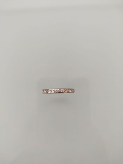 American wedding band in white gold set with...