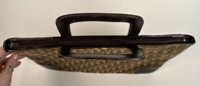 CHRISTIAN DIOR
Handbag in signed canvas and...