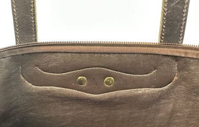 CHRISTIAN DIOR
Handbag in signed canvas and...