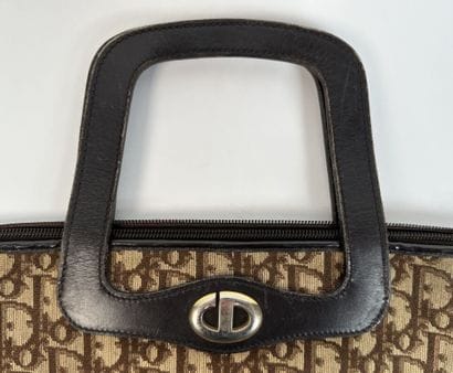 CHRISTIAN DIOR
Handbag in signed canvas and...