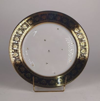 SEVRES
Three porcelain plates with blue marli...