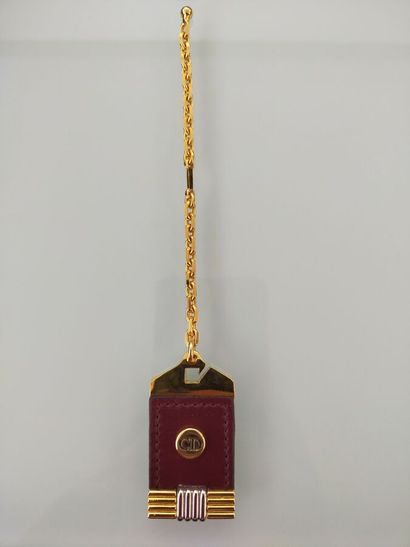 CHRISTIAN DIOR
Key ring in gilded metal and...