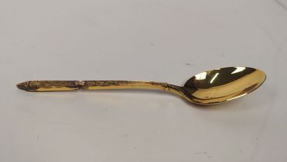 12 mocha spoons and sugar tongs in silver...