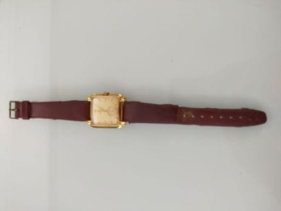 ROLEX
Rectangular men's watch in 18K yellow...