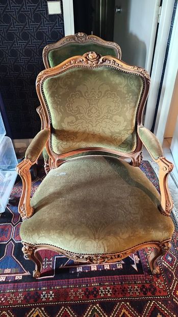 Pair of molded and carved natural wood armchairs,...