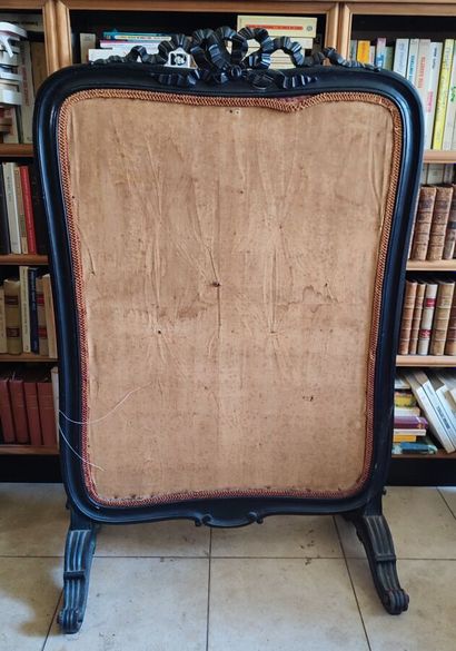 Moulded blackened wood fire screen, embroidered...