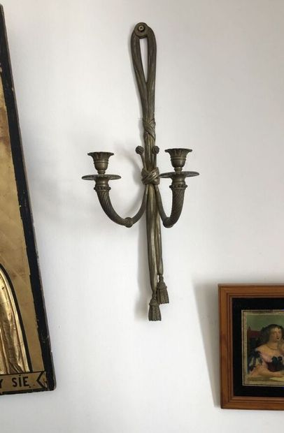 Pair of bronze sconces, knotted ribbon
Height...