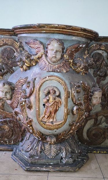Altar piece in carved wood, decorated with...