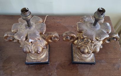 Pair of partially gilded wooden lampstands
Louis...