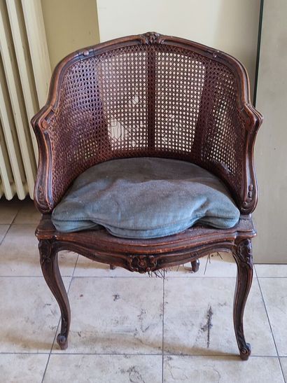Set of mismatched armchairs: a cabriolet...