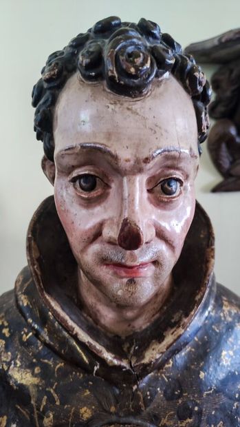 Chef-reliquaire en bois sculpté polychrome...
