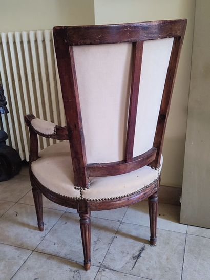 Set of mismatched armchairs: a cabriolet...