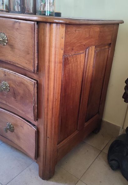 Walnut chest of drawers with curved front...