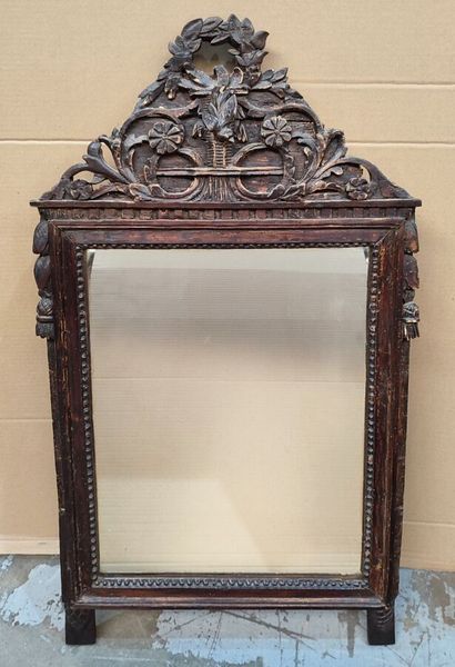 Carved molded natural wood mirror decorated...