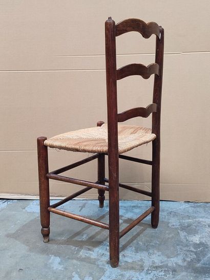 Louis XIII-style wooden chair with high back,...