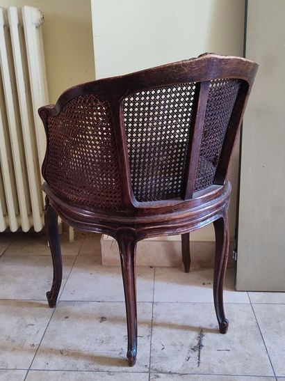 Set of mismatched armchairs: a cabriolet...