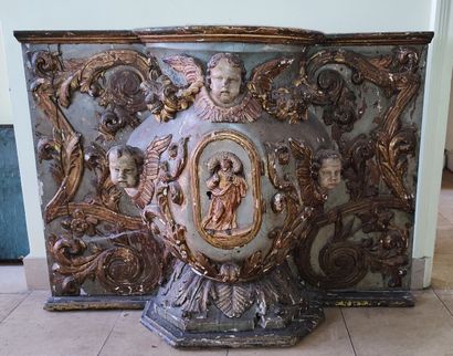 Altar piece in carved wood, decorated with...