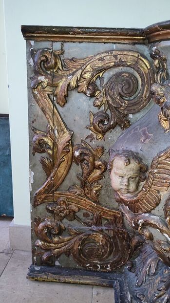 Altar piece in carved wood, decorated with...