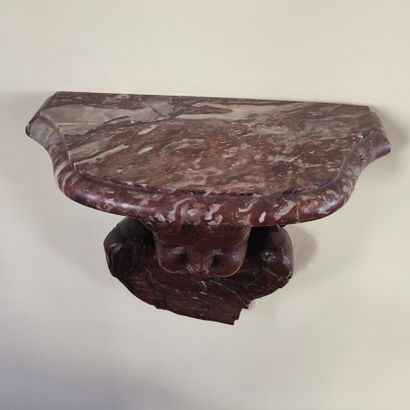 Pair of wall brackets in carved wood decorated...