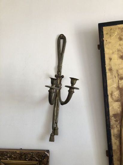 Pair of bronze sconces, knotted ribbon
Height...