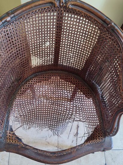 Set of mismatched armchairs: a cabriolet...
