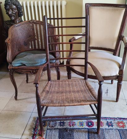 Set of mismatched armchairs: a cabriolet...