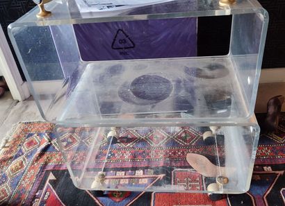 Pair of transparent Plexiglas sofa ends on...