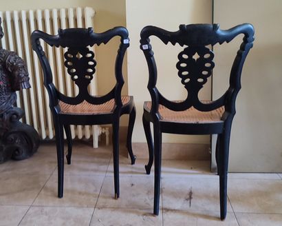 Set including a pedestal table with a black...
