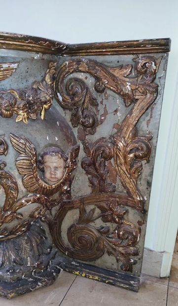Altar piece in carved wood, decorated with...