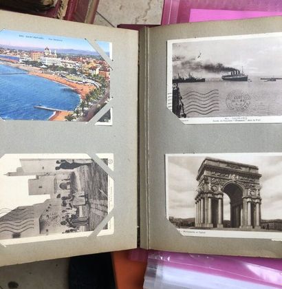 Old picture albums 
Albums of old postcards,...