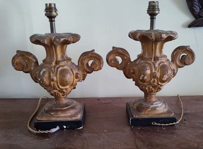 Pair of partially gilded wooden lampstands
Louis...