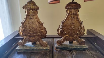 Pair of gilded wood lampstands decorated...