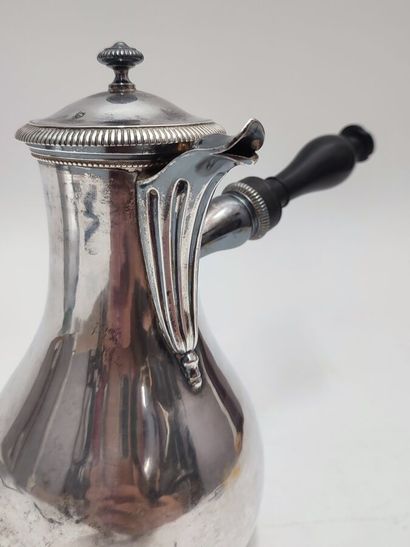 Silver coffee pot with turned blackened wood...