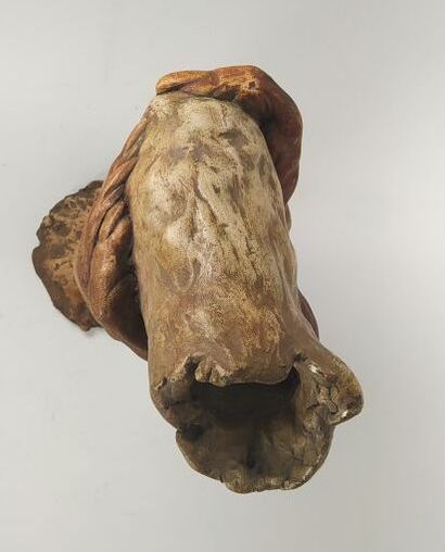 Terracotta sculpture of two embracing hands
Signed...