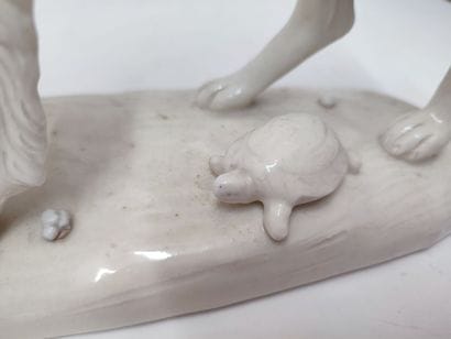 Lot of two ceramic dogs:
- a Capodimonte...