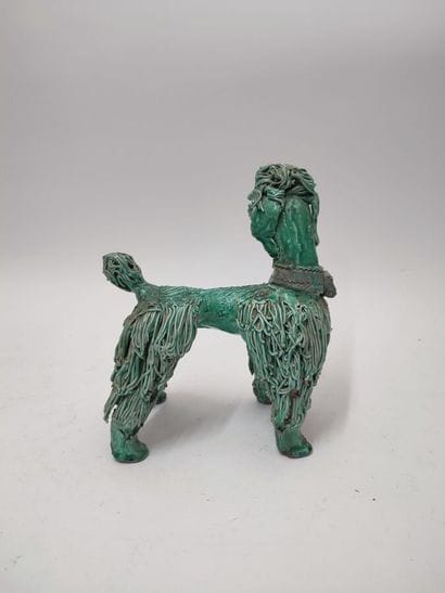 Lot of two ceramic dogs:
- a Capodimonte...