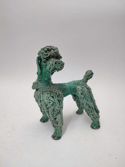 Lot of two ceramic dogs:
- a Capodimonte...