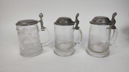 Set of glass, pewter or metal mugs
A set...