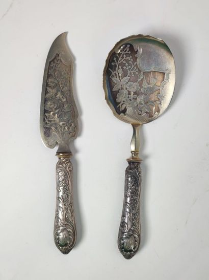 A silver pie server and ice cream scoop 
Minerve...