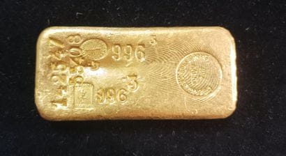 Gold ingot
N° 142547 and 55408. 
Indicated...