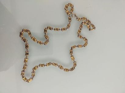 Yellow gold necklace with enameled links
Gross...