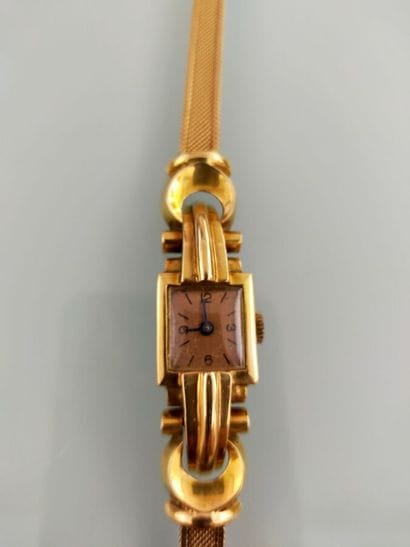 Lady's tank wristwatch in 18k gold
Gross...