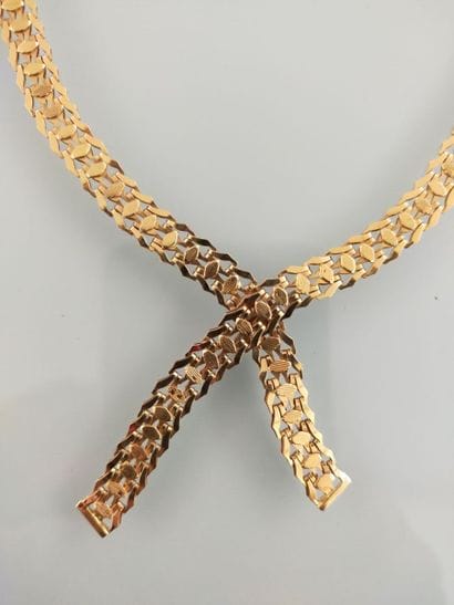 Tie necklace in 18 K yellow gold with openwork...
